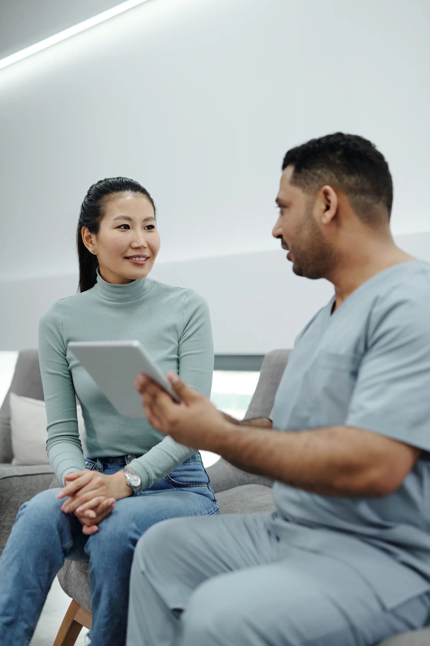 A patient discussing care information with a medical professional